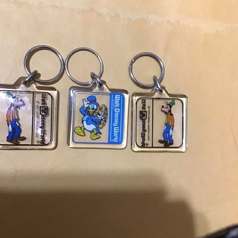 Vintage Official Walt Disney World keychains, two goofy one Donald Duck